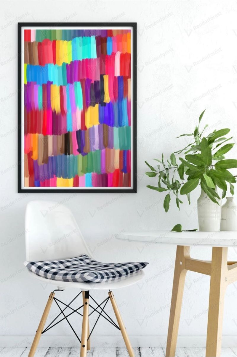 A Colourful Pop displayed in a bright interior beside a chair and plants